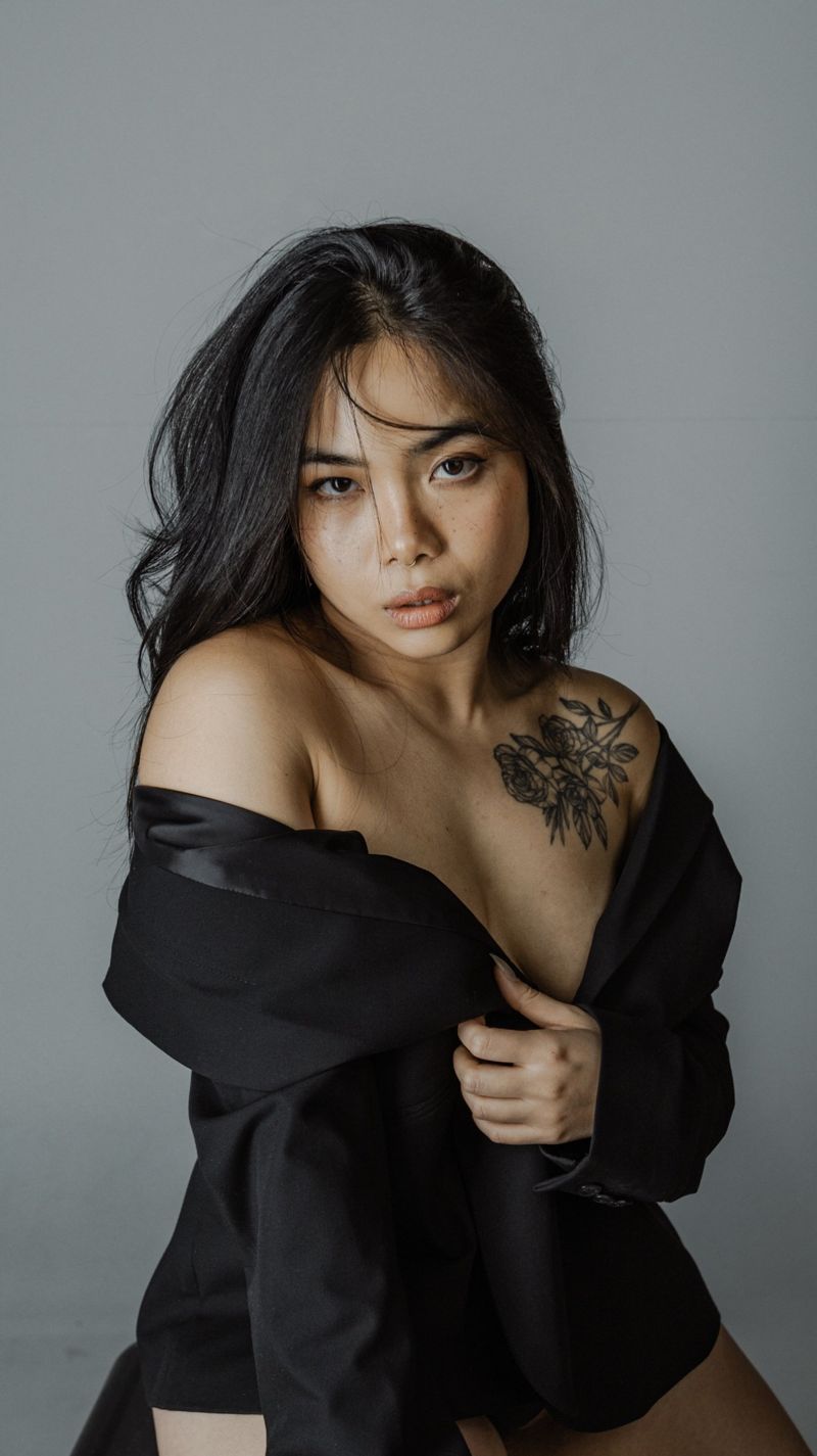 Off-the-shoulder portrait in a black blazer