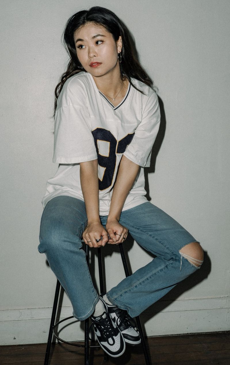 Portrait leaning on a stool
